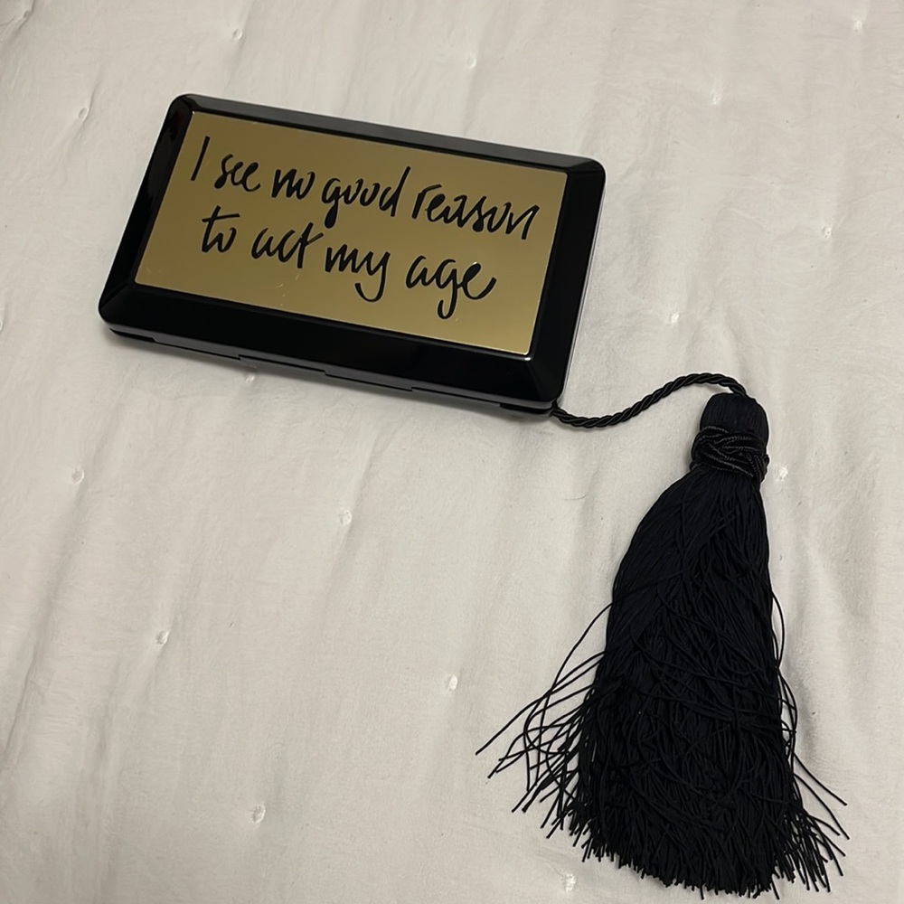 Kilian black and gold limited edition clutch